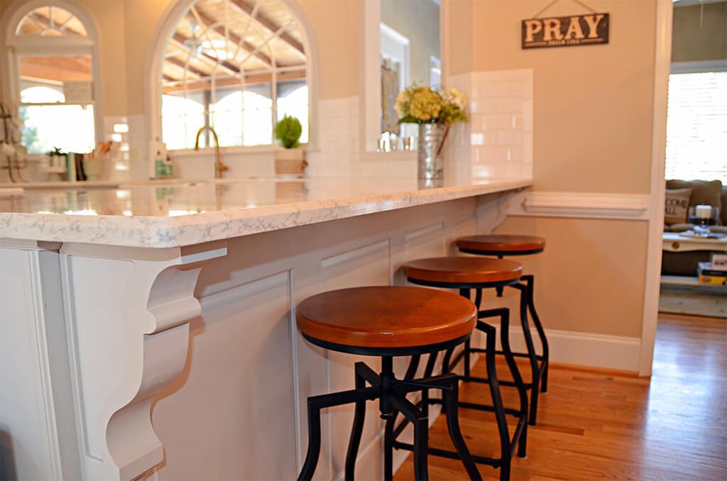 Kitchen Remodel in Roswell peninsula with corbel under Wording under picture is Peninsula for Kitchen Remodel in Roswell has corbels too